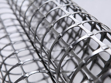 ¿Cuál es el significado de Polyester Geogrid?